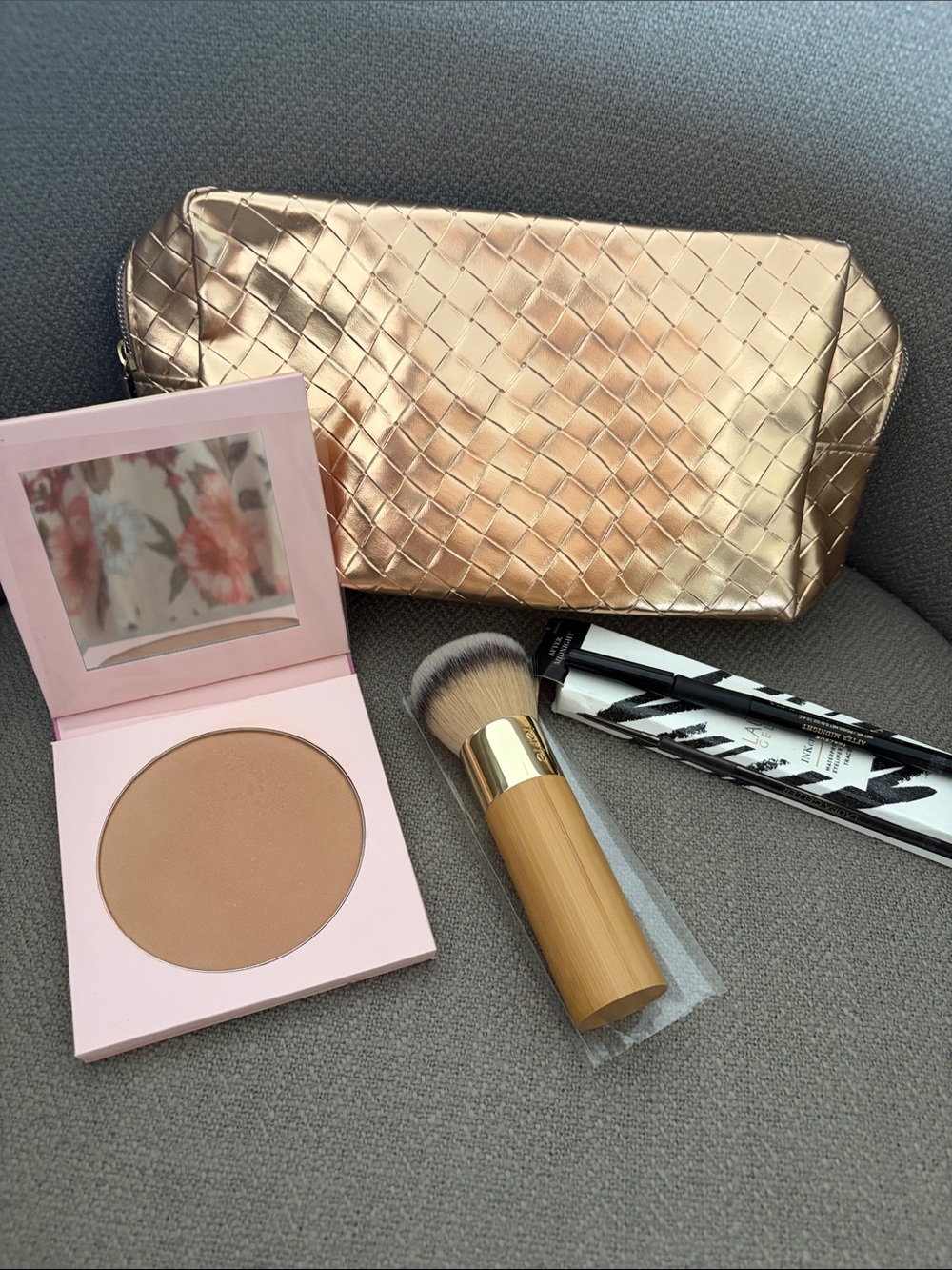 4 piece Tarte & Laura Geller set